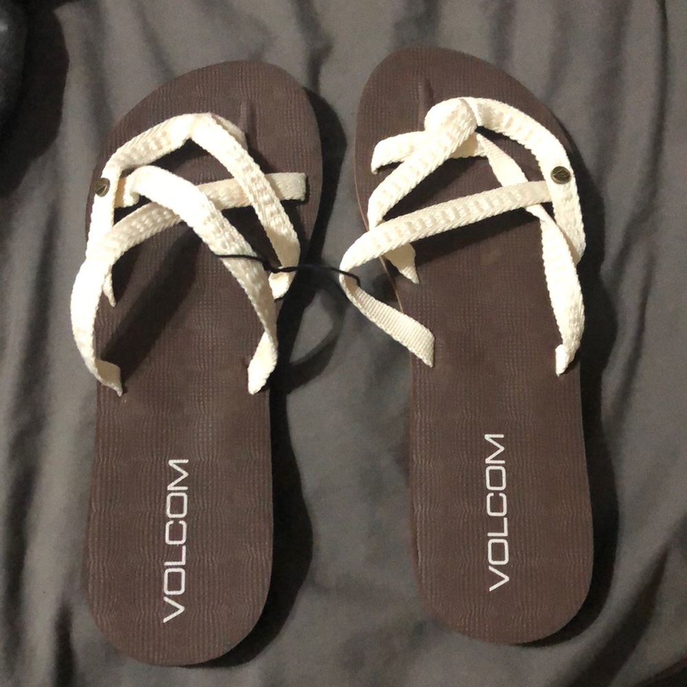 Brand new Volcom flip flops. Size 8